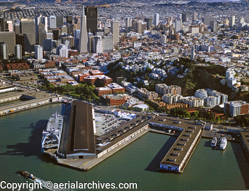 © aerialarchives.com Pier 27 | Pier 29 | San Francisco, CA aerial photograph toward the
Transamerica Building and Bank of America Building
with Coit Tower,  APF2DM, AHLB2047