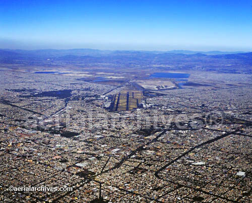 © aerialarchives.com aerial overview of Mexico City with the Benito Juarez International airport in Mexico City aerial photograph, AEE85X, AHLB2211