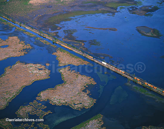 © aerialarchives.com freight train crosses wetlands in the Mississippi river delta; AHLB2314
