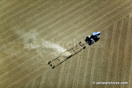 © aerialarchives.com aerial photograph of California agriculture, plowing a field in california central valley, AHLB2422.jpg