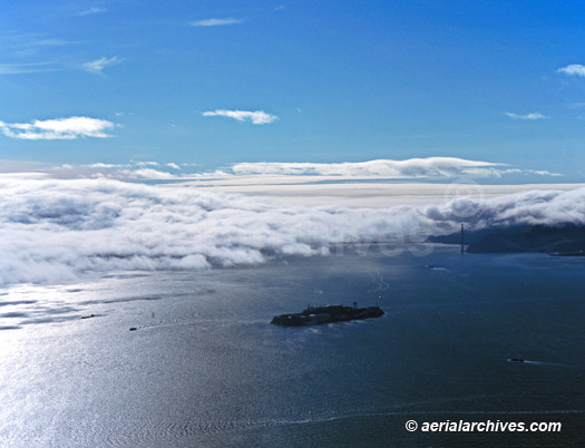© aerialarchives.com Fog Rolling into San Francisco Bay through the Golden Gate with Alcatraz in the foreground, AHLB3681, ABF41R