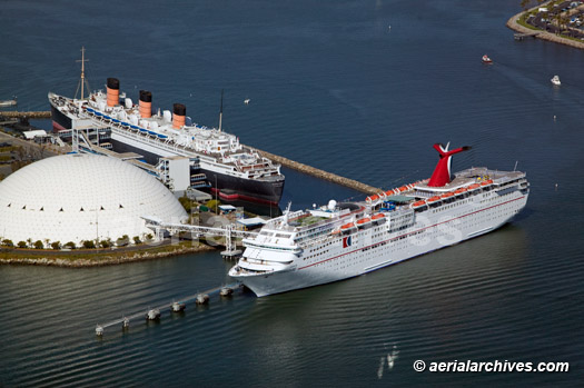 © aerialarchives.com aerial  Queen Mary and Carnival cruise ships Paradise vessel Long Beach harbor, California
AHLB4686
