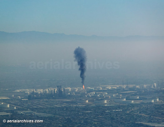 © aerialarchives.com air pollution hangs over Los Angeles as a Long Beach refinery release smoke, aerial image id: AHLB4438